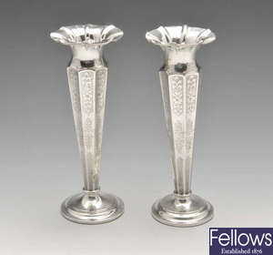 A pair of Edwardian silver bud vases.