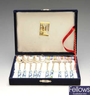 A cased set of Korean silver and enamel dessert forks and spoons.