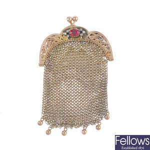 An early 20th century garnet-topped-doublet and diamond purse.