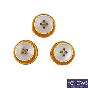 A set of three early 20th century 18ct gold mother-of-pearl dress studs.