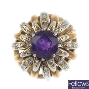 An amethyst and diamond floral dress ring.