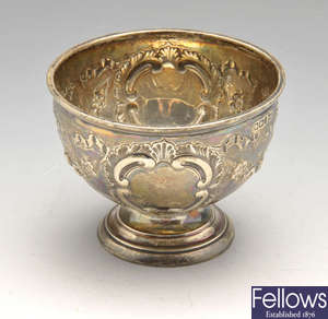 An Edwardian embossed silver footed bowl & a 1920's silver tazza.