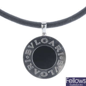 BULGARI - a 'Bulgari' gem-set pendant, with leather cord.