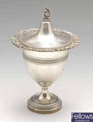 An Italian silver pedestal sugar bowl and cover.
