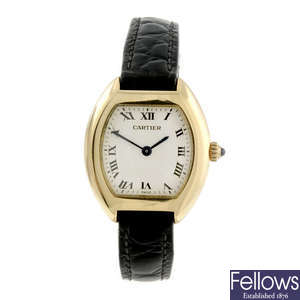 CARTIER - an 18ct yellow gold Tonneau wrist watch.