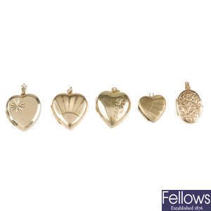 A 9ct gold locket and four 9ct back and front lockets.