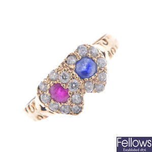 A ruby, sapphire and diamond dress ring.