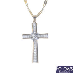 A 9ct gold diamond cross pendant, with chain.