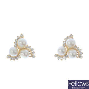 A pair of cultured pearl and diamond trefoil earrings.