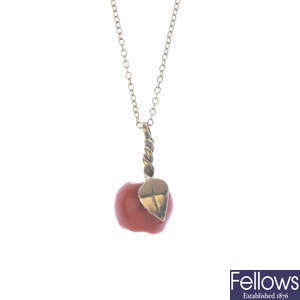 A 9ct gold coral apple pendant and chain.