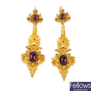 A pair of mid Victorian gold garnet and serpent ear pendants.