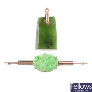 A jadeite brooch and nephrite pendant.
