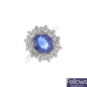 An 18ct gold synthetic sapphire and diamond cluster ring.