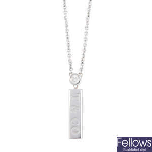 TIFFANY & CO. - a diamond pendant, on chain.