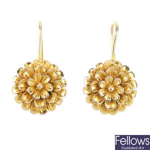 A pair of floral earrings.