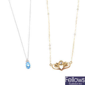 Two 9ct gold gem-set pendants, with chains.