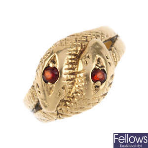 A 9ct gold garnet snake ring.