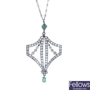 A 1920s Art Deco platinum emerald and diamond pendant, with chain.