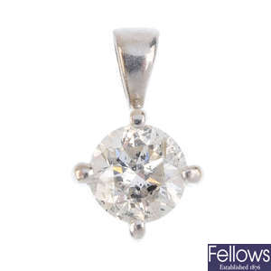 A brilliant-cut diamond single-stone pendant.