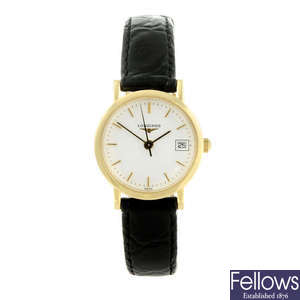 LONGINES - a lady's 18ct yellow gold Presence wrist watch.