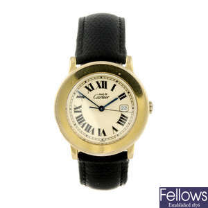 CARTIER - a gold plated silver Must de Cartier Ronde wrist watch.