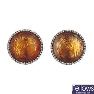 A pair of citrine cameo and diamond earrings.