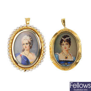 Two painted portrait brooches.