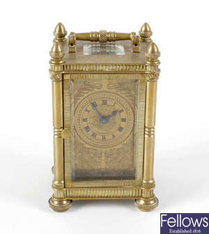 A miniature brass cased carriage clock.