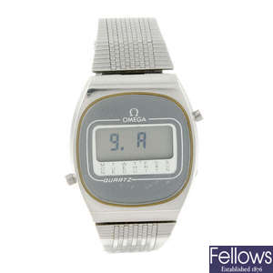 OMEGA - a gentleman's stainless steel digital bracelet watch.