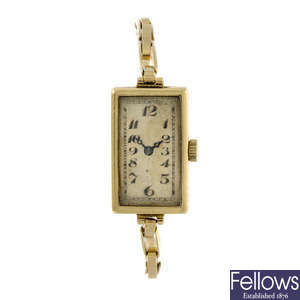ROLEX - a lady's 18ct yellow gold bracelet watch.
