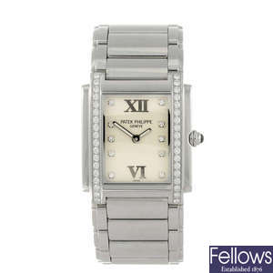PATEK PHILIPPE - a lady's factory diamond set stainless steel Twenty-4 bracelet watch.
