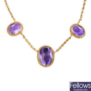 An amethyst cameo necklace.