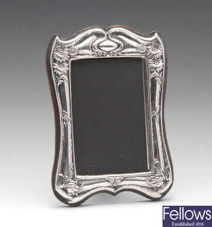 An Art Nouveau silver mounted photograph frame.