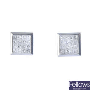 A pair of diamond panel stud earrings.