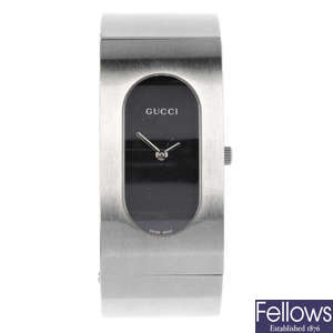 GUCCI - a lady's stainless steel 2400L bangle watch.