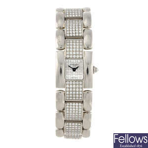 CHAUMET - a lady's factory diamond set 18ct white gold Khesis bracelet watch.