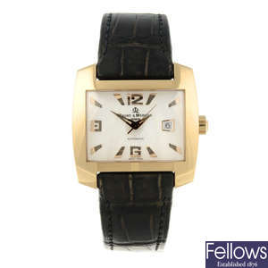 BAUME & MERCIER - a limited edition gentleman's 18ct yellow gold Hampton wrist watch.