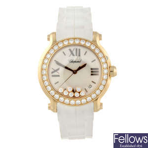 CHOPARD - a lady's 18ct yellow gold Happy Sport wrist watch.