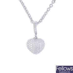 THEO FENNELL - an 18ct gold diamond heart pendant, with chain.