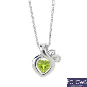 An 18ct gold peridot and diamond pendant, with chain.