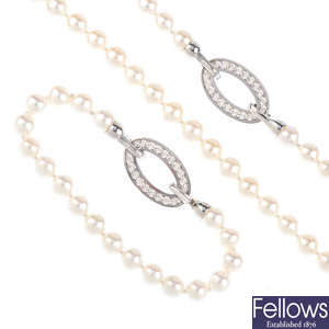 A cultured pearl and diamond necklace with matching bracelet.