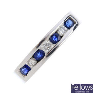 An 18ct gold sapphire and diamond band ring.