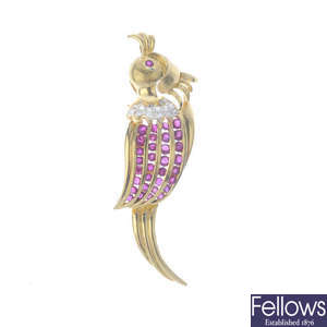 A ruby and diamond parrot pendant.