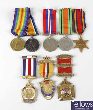 A small selection of various medals and coins.