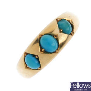 A turquoise three-stone ring.