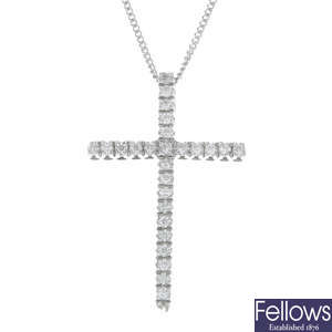 A diamond cross pendant, with 18ct gold chain.