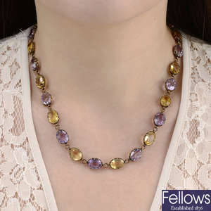 A late 19th century 18ct gold amethyst and citrine rivière necklace.