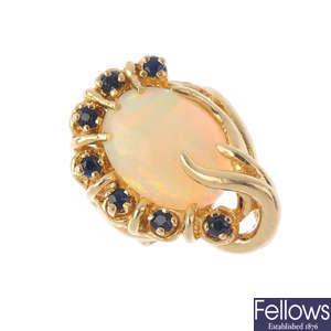 An opal and sapphire dress ring.