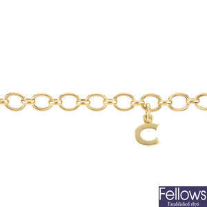 LINKS OF LONDON - an 18ct gold charm bracelet.