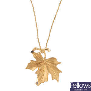 A leaf brooch and a chain.